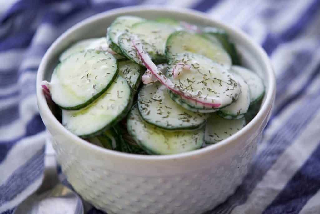 Old Fashioned Cucumber Salad in a white bowl. 