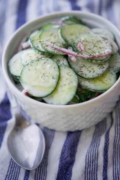 Old Fashioned Cucumber Salad is a creamy, mayo based, slightly tart salad that is perfect for those Summer cookouts or game day parties. 