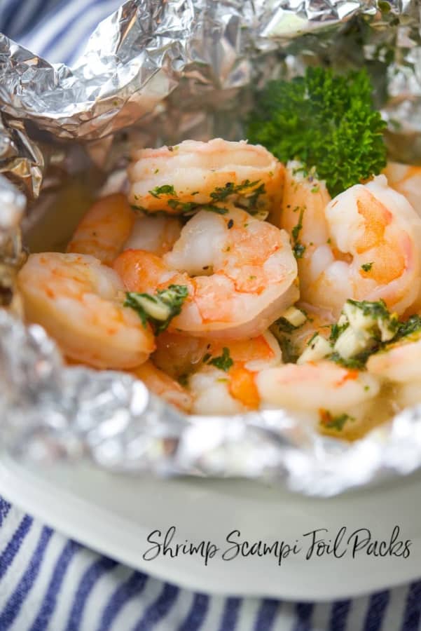 A plate of food on a table, with Shrimp and Scampi