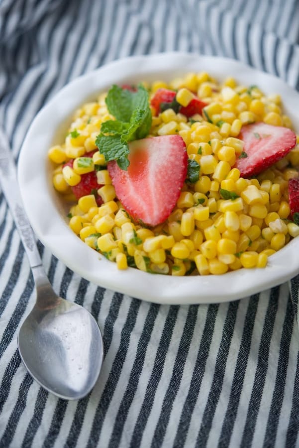 A bowl of Strawberry Mint Corn Salad