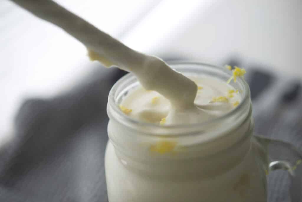 Frosted Lemonade in a glass with straw