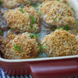 Chicken Vermont chicken thighs in a casserole dish.