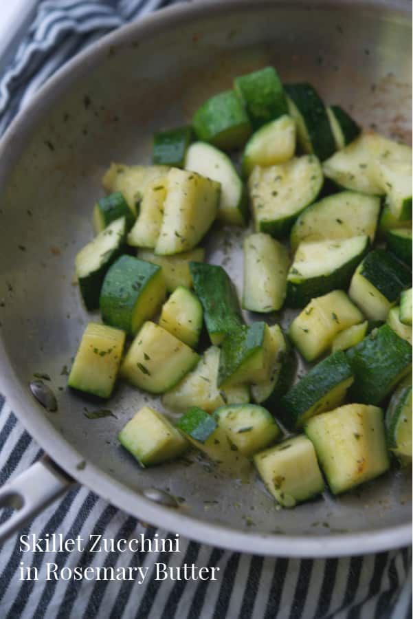 Zucchini squash in a skillet on top of the stove.