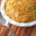 Mashed Carrot Casserole made with fresh carrots, butter, maple syrup and brown sugar topped in a buttery Ritz cracker topping. 