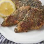 Boneless chicken breasts dredged in herbs and spices; then pan fried in extra virgin olive oil makes this a quick, easy and delicious weeknight meal. 