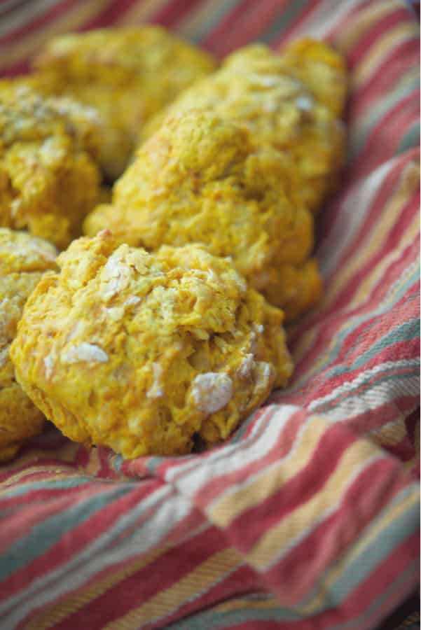 These flaky Pumpkin Drop Biscuits are so deliciously light and buttery, you'll never make homemade yeast rolls again! 