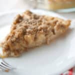 Change up your ordinary apple pie with this version made with a sour cream apple filling topped with buttery streusel.
