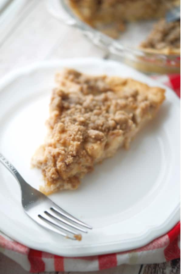 Change up your ordinary apple pie with this version made with a sour cream apple filling topped with buttery streusel.