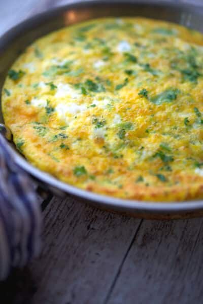 This Broccoli and Cheddar Frittata is made with four ingredients in less than 30 minutes. It's a great way to feed breakfast for a crowd!