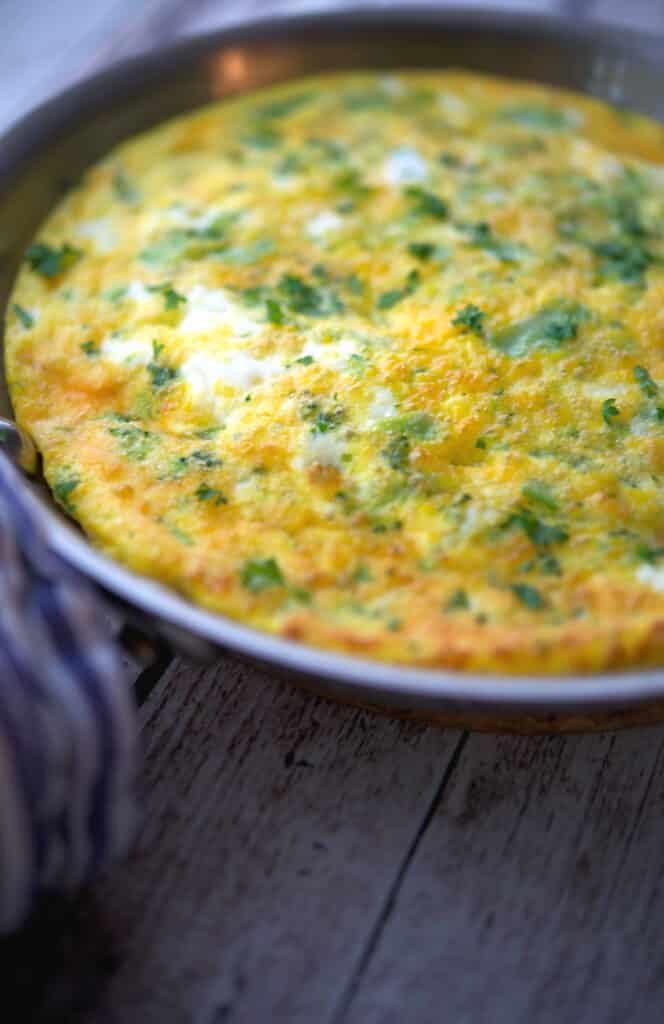 This Broccoli and Cheddar Frittata is made with four ingredients in less than 30 minutes. It's a great way to feed breakfast for a crowd!