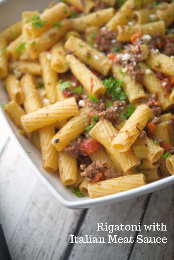 Rigatoni pasta tossed with a mirepoix of vegetables and spices in a fire roasted tomato meat sauce makes the perfect quick, weeknight meal. 