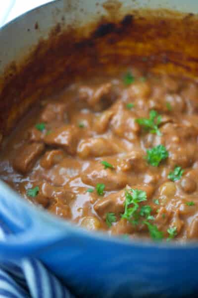 Beef Bourguignon made with beef cubes, pearl onions and mushrooms in a Cognac, red wine brown gravy is comfort food at its best. 