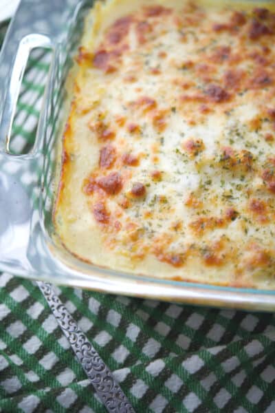 This short cut Chicken Pesto Spaghetti Squash can be ready in 30 minutes for a quick, delicious weeknight meal! 