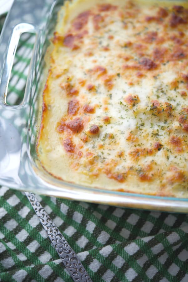 This short cut Chicken Pesto Spaghetti Squash can be ready in 30 minutes for a quick, delicious weeknight meal! 