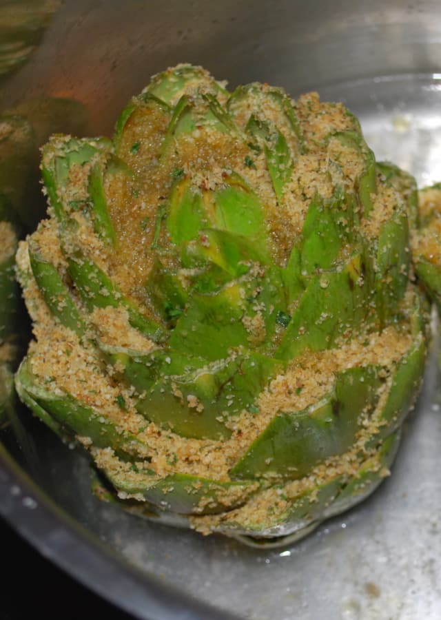 Whole artichokes stuffed with Italian seasoned breadcrumbs, grated Pecorino Romano cheese, spices and olive oil. 