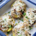 Antipasto Twice Baked Potatoes made with Yukon gold potatoes, Italian Soppressata, Kalamata olives and Asiago cheese make a super flavor side dish. 