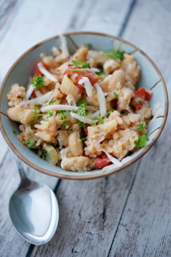 Italian Beans and Rice made in the slow cooker with Cannellini beans, fire roasted tomatoes, fennel and pesto.