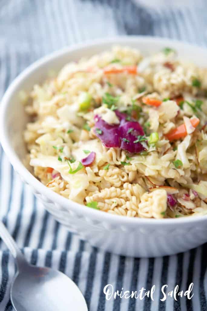 This classic Oriental Salad made with Ramen noodles, cabbage, carrots and almonds is super flavor and a favorite at every gathering. 