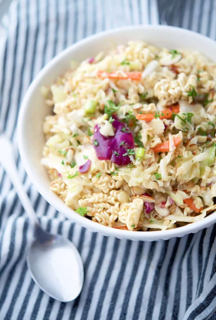 This classic Oriental Salad made with Ramen noodles, cabbage, carrots and almonds is super flavor and a favorite at every gathering.