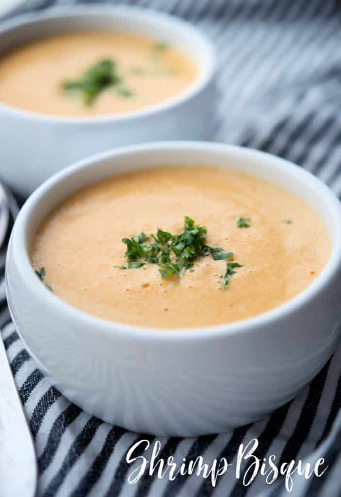 This Shrimp Bisque recipe made with a mirepoix of vegetables, shrimp, sweet Moscato wine, spices and heavy cream is deliciously creamy. 
