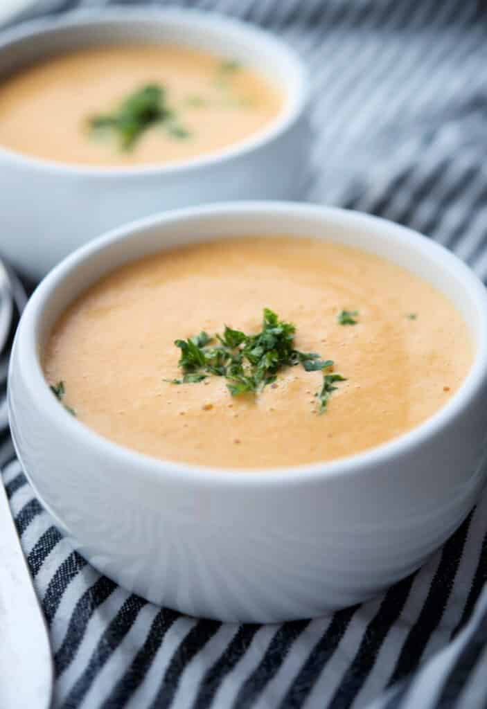 This Shrimp Bisque recipe made with a mirepoix of vegetables, shrimp, sweet Moscato wine, spices and heavy cream is deliciously creamy. 