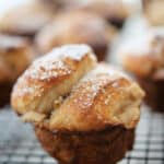 Monkey bread rolls made with fresh chopped apples, brown sugar, ground cinnamon and chopped walnuts make a tasty, sweet snack. 