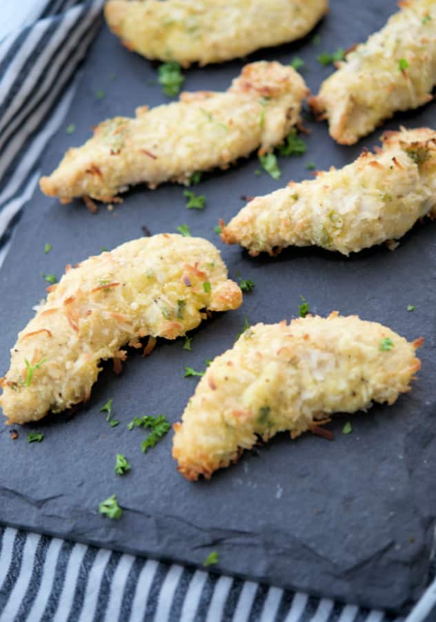 Coconut Chicken Tenders on a gray plate