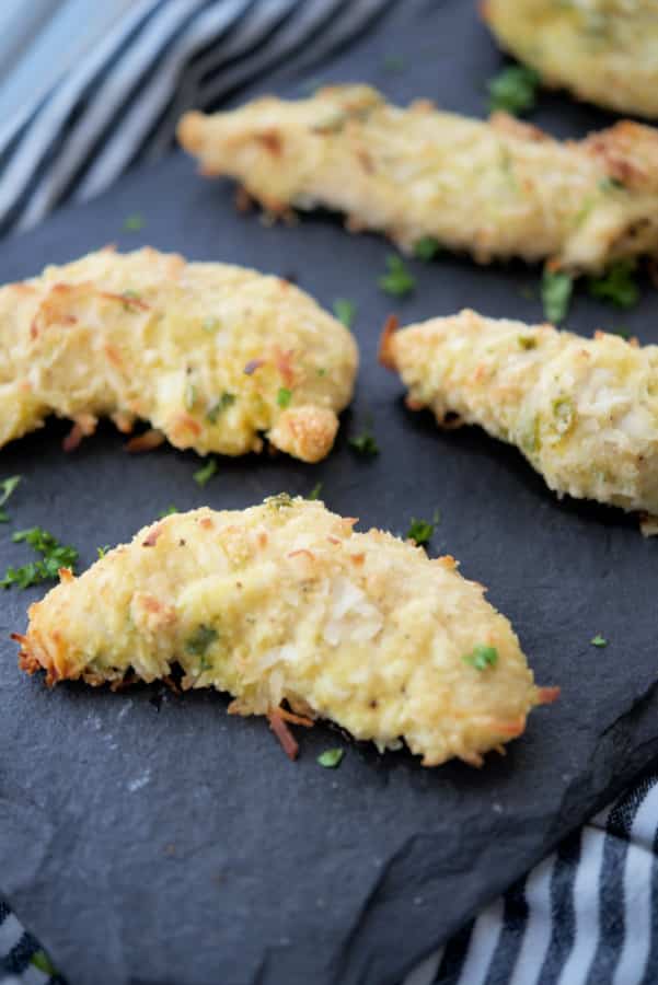 A piece of food, with Coconut chicken tenders