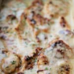 Boneless chicken breasts lightly floured, pan fried; then topped with chives and a buttery Irish Whiskey Cream Sauce.