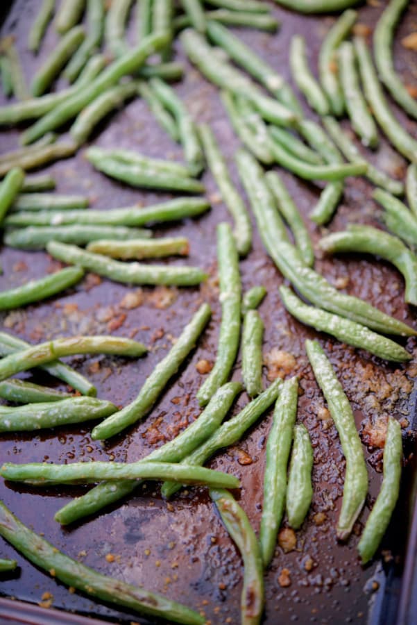 Parmesan Roasted Green Beans on a sheet pan.