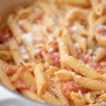 Penne alla Vodka made with a creamy, pink vodka tomato sauce is one of our favorite recipes to make during family gatherings.