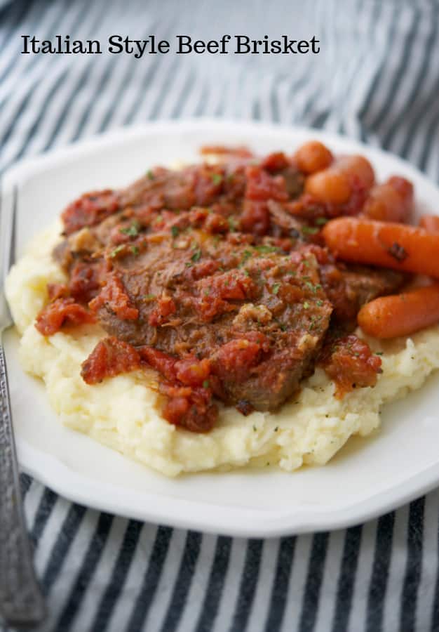 Oven roasted beef brisket made Italian style with oregano, garlic and fire roasted tomatoes makes a tasty, comforting family meal.