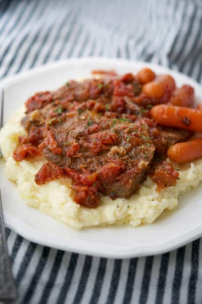 Italian Style Beef Brisket on top of mashed potatoes