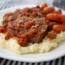 Italian Style Beef Brisket with carrots and mashed potatoes.