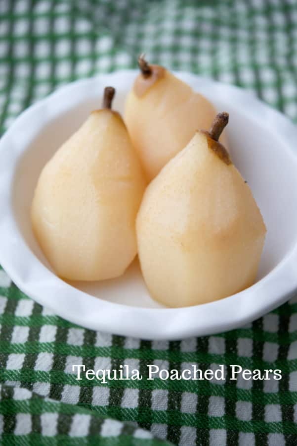 Bosc pears slowly poached in a crock pot with tequila, pear nectar, sugar and lime juice makes a tasty adult treat!