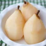 Bosc pears slowly poached in a crock pot with tequila, pear nectar, sugar and lime juice makes a tasty adult treat.