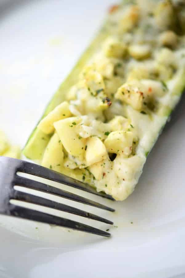 Ranch Zucchini Boats are stuffed with chopped fresh zucchini, garlic, Ranch seasoning, EVOO and shredded Mozzarella cheese. 