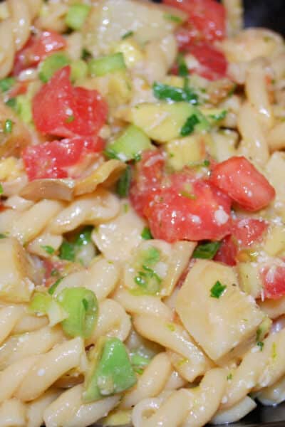 This salad made with pasta combined with fresh avocado, tomatoes, and artichoke hearts; then tossed in a light Cilantro Lime Vinaigrette. 