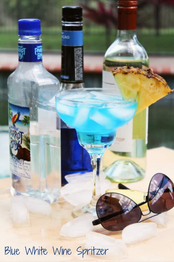 This cool and refreshing Blue White Wine Spritzer made with four ingredients will be your new favorite Summertime patriotic drink. 