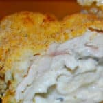 Boneless chicken breasts stuffed with garlic and herb spreadable cheese; then breaded and baked until golden brown. 