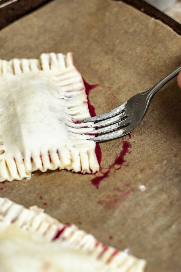 Mixed Berry Hand Pies before cooking with a fork