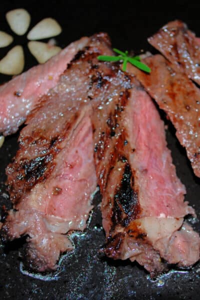 Rib Eye steaks marinated in red wine, cognac, stone ground mustard, garlic, rosemary and Extra Virgin Olive Oil. 