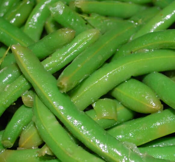 Fresh green beans steamed; then sautéed with butter, chicken and beef broth, Kosher salt and black pepper will be your new favorite vegetable. 