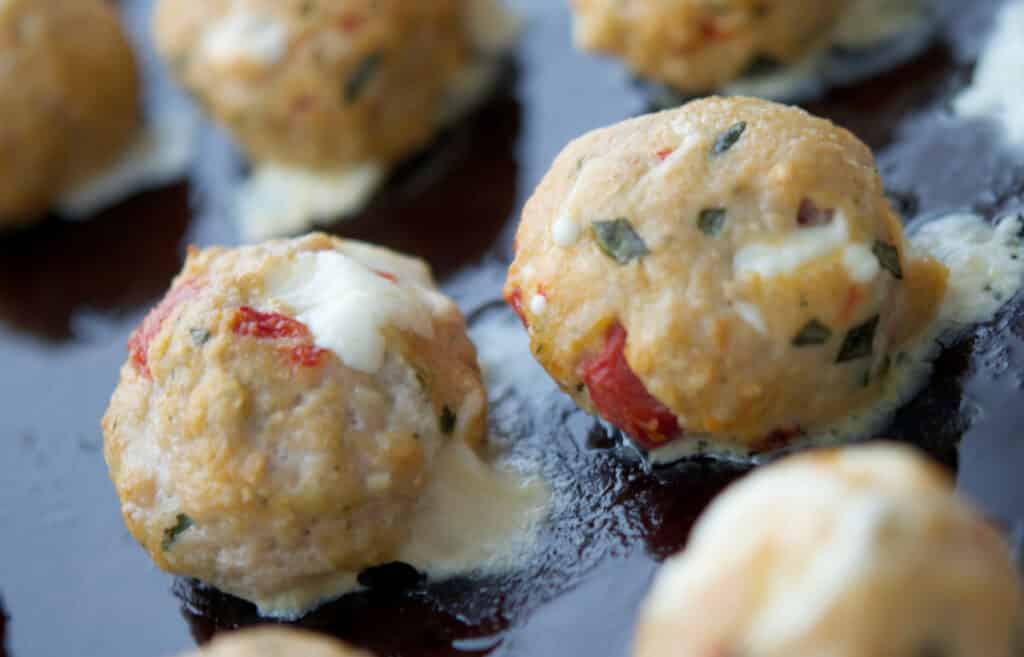 Caprese Chicken Meatballs on a sheet pan