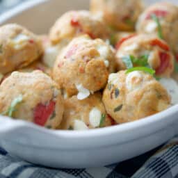 Baked Caprese Chicken Meatballs in a white dish