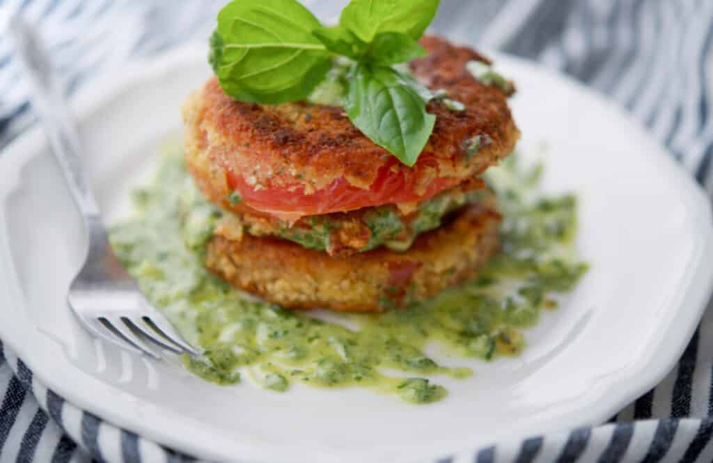 Fried Tomatoes with Pesto Crema on a plate