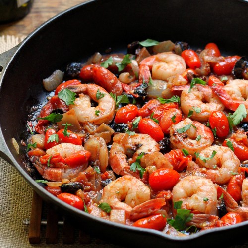 Shrimp Puttanesca in an iron skillet