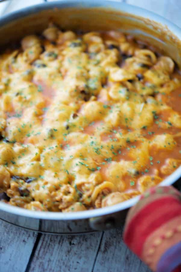skillet with chicken, cheese and beans