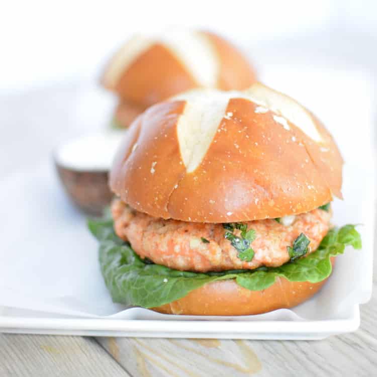 salmon burgers closeup on a plate
