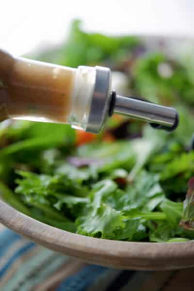 Honey Balsamic Dressing made with Dijon mustard, honey, balsamic vinegar and fresh rosemary is perfect for tossed salads or used as a marinade. 